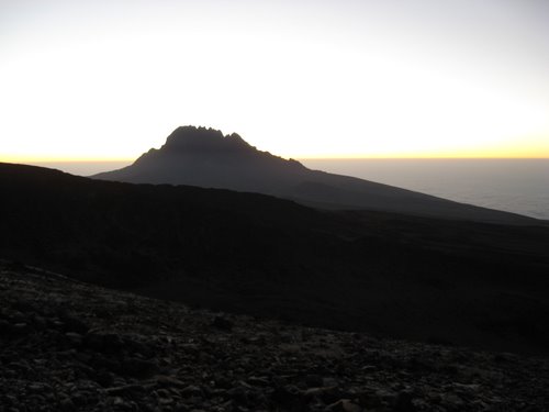 Sunrise from Barafu. Mawenzi peak in the distance.